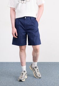 Carhartt WIP Šortky - dark-blue denim
