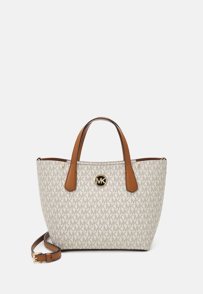 Sac cabas Michael Kors beige et marron avec doubles anses, motif logo MK, emblème circulaire en or MK, et bandoulière amovible.