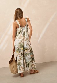 Next Kombinezonas - white lemon print