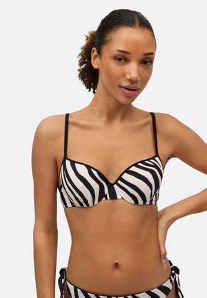 Top de bikini a rayas blancas y negras con soporte de varilla, tirantes delgados ajustables y costuras en contraste a lo largo de los bordes.