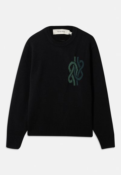 Black knitted sweater with round neck and a green abstract knot design on the chest, featuring ribbed cuffs and hem.
