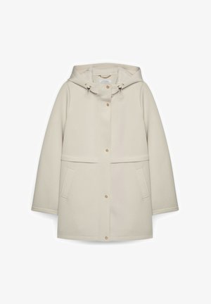 Helles cremefarbenes Kapuzenmantel aus glattem, wasserabweisendem Material. Verfügt über Druckknöpfe, Taschen vorne und verstellbare Kordeln an der Kapuze.