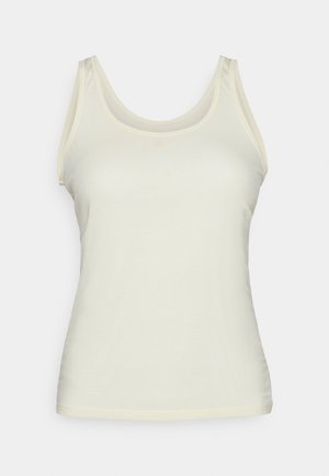 Top sin mangas de color beige claro con tirantes anchos, escote redondo y un tejido suave y liso. Presenta bordes cosidos y un diseño ajustado.