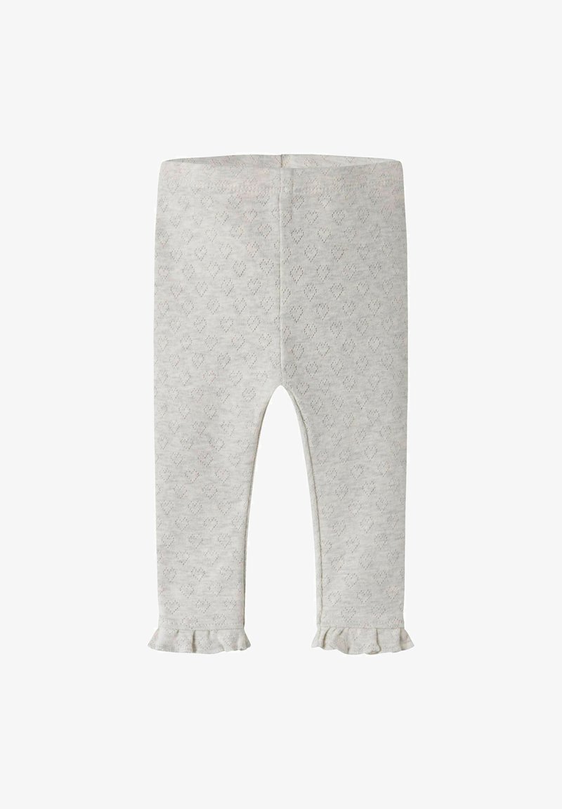 Leggings bébé gris clair avec un motif discret en forme de cœur et des ourlets à volants sur les deux jambes, présentés sur un fond blanc.