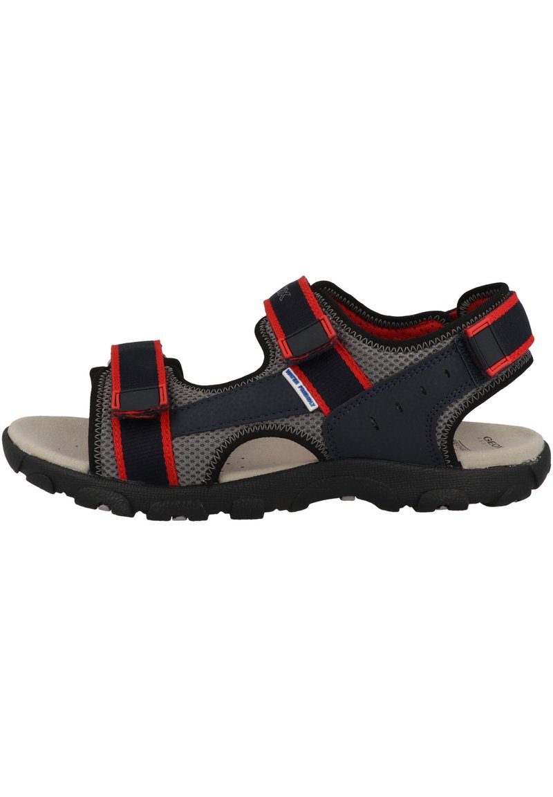 Infradito da uomo con tomaia in rete nera e grigia, dettagli rossi, cinturini regolabili, soletta imbottita e suola in gomma nera con battistrada.