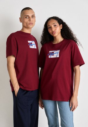 Unisex Reserved ‘R’ Carpet Tee