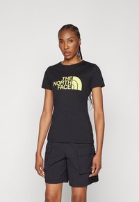 The North Face - EASY TEE - T-shirt med print - black/sun yellow Miniatyrbild 1