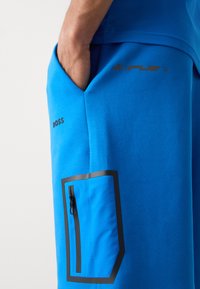 BOSS HARIQ  - Verryttelyhousut - open blue