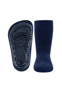 Granatowe skarpetki z teksturowaną gumową podeszwą dla lepszej przyczepności, z gładką górą wykonaną z mieszanki bawełny oraz bezszwowym palcem dla wygody.