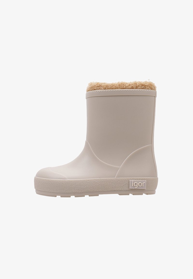 Bota infantil impermeable beige con un suave forro de piel sintética color canela, suela de goma texturizada y detalle de logo en el lateral. Diseño liso y redondeado.