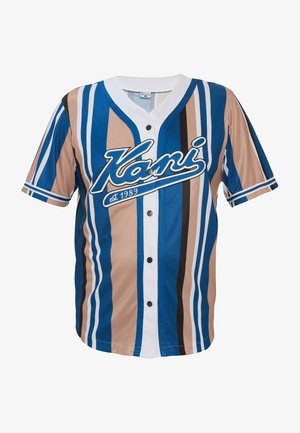 Rövid ujjú mez kék, bézs és fekete csíkos mintázattal. Gombos elejével, fehér díszítéssel és egy feltűnő "Kani" logóval rendelkezik.