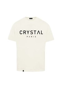 Krémové bavlněné tričko s krátkými rukávy, s tučným černým nápisem "CRYSTAL PARIS" na přední straně a malým logem na spodním lemu.