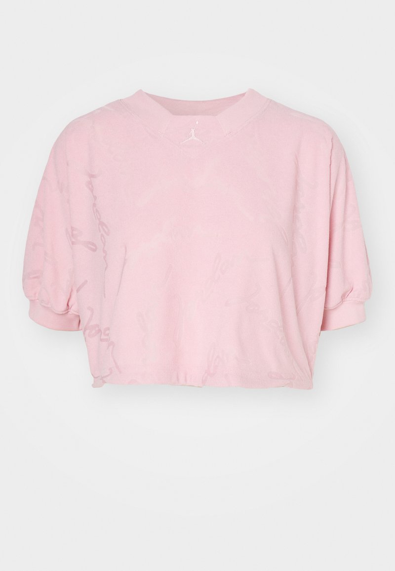 Felpa corta rosa in materiale morbido con maniche corte e gonfiate e un modello di logo discreto. Presenta un colletto a V e un orlo elastico.