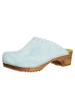 Light blue suede clogs with a wooden sole, featuring scalloped edges and cut-out details. Textile upper with green insole and durable outsole.