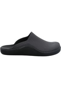 Gray slip-on shoe featuring a textured upper and a contrasting black rubber sole with a curved, stitched design.