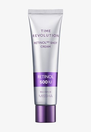 Tube med Missha Time Revolution Retinol 500 Shot Cream, 60 ml, sølv med lilla lokk og etikett detaljer.