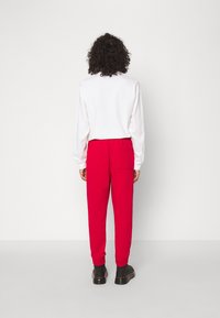 Jordan Jogginghose - gym red