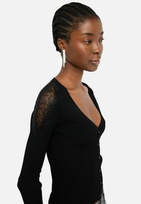 LIU JO Chaqueta de punto - black