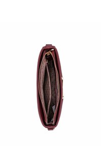 Burgundy leather handbag with a zip closure, featuring a spacious interior with three compartments and a polka dot lining. Gold-tone hardware.