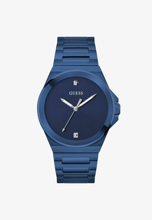 Niebieski zegarek analogowy z okrągłą kopertą, niebieską tarczą, srebrnymi wskazówkami i prostokątnymi znacznikami godzin. Wykonany z metalu, z bransoletą w stylu ogniw.