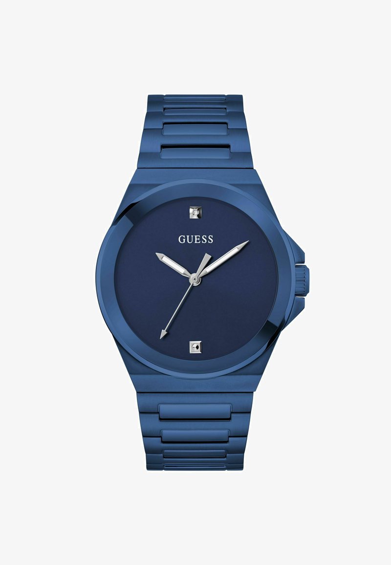 Niebieski zegarek analogowy z okrągłą kopertą, niebieską tarczą, srebrnymi wskazówkami i prostokątnymi znacznikami godzin. Wykonany z metalu, z bransoletą w stylu ogniw.