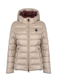 Giacca imbottita beige con cappuccio, design trapuntato, chiusura frontale con zip, due tasche laterali e fodera interna a contrasto color marrone scuro.