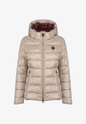 Giacca imbottita beige con cappuccio, design trapuntato, chiusura frontale con zip, due tasche laterali e fodera interna a contrasto color marrone scuro.