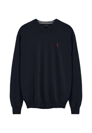 Jersey azul marino con cuello en V y mangas largas, puños y bajo con canalé, con un pequeño logo rojo bordado en el pecho izquierdo.