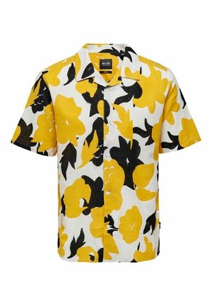 Chemise à manches courtes avec un motif floral jaune et noir audacieux sur fond blanc. Fabriquée en tissu léger avec une coupe décontractée.