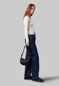 Calvin Klein Jeans CRESCENT - Borsa a tracolla - black