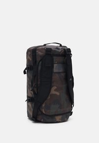 The North Face BASE CAMP DUFFEL S UNISEX - Saco de viagem - kelp tan/black