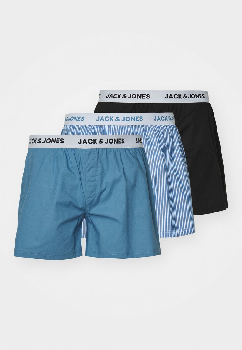 Three pairs of men's boxers: one solid blue, one black, and one with blue stripes. All feature elastic waistbands with "JACK & JONES" logo.
