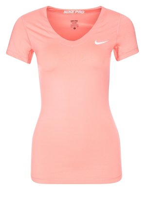 Slim-Fit Korallenrosa Nike Pro Damen Sportshirt mit kurzen Ärmeln, V-Ausschnitt und weißem Nike-Swoosh-Logo auf der Brust.