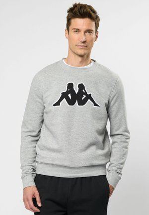 Hellgrauer Sweatshirt aus Baumwolle mit einem schwarzen Silhouetten-Design auf der Vorderseite. Rippbündchen und -saum runden den Look ab.