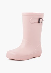 Botte de pluie en caoutchouc rose avec une semelle texturée, forme cylindrique simple, détail de boucle latérale et finition mate lisse.