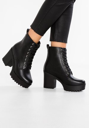 Bottines à talons hauts - black