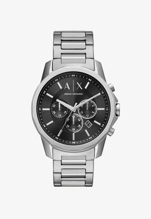 Roostevabast terasest kell musta sihiga, hõbedaste indekseerijatega, kolme alamkellaga ja kuupäeva aknaga. Omab metallist link-randmestikku ja kaheksanurkset korpust.