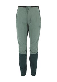 Pantalon technique vert clair avec des jambes inférieures vert foncé, doté d'une fermeture à bouton, de poches, et d'une coupe slim effilée. Texture douce.