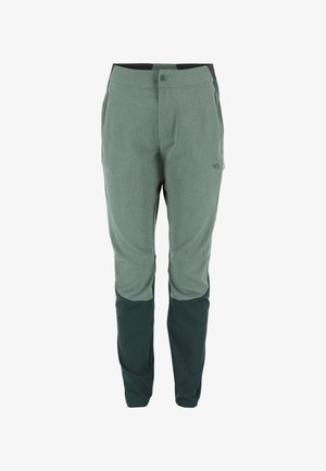 Lichtgroene technische broek met donkerdere groene onderbenen, voorzien van een knoopsluiting, zakken en een slanke, taps toelopende pasvorm. Zachte textuur.