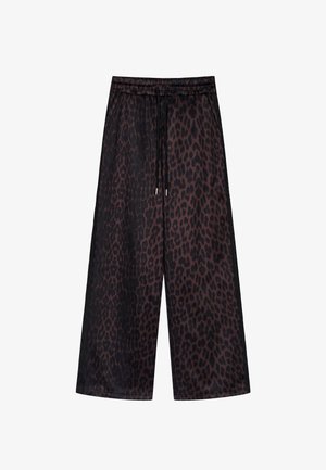 Pantalones de pierna ancha con estampado de leopardo, hechos de un tejido ligero. Cuentan con una cintura elástica con cordones y una textura suave.