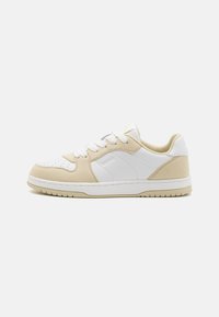 White and beige sneaker with a smooth leather upper, suede accents, perforated toe box, round laces, and a rubber sole.
