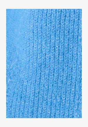 Tissu tricoté bleu clair avec une texture douce et duveteuse. Un motif côtelé vertical distinct améliore la profondeur et l'intérêt visuel.