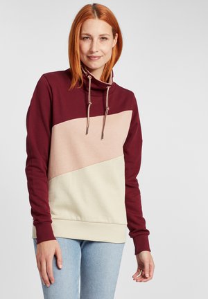 Maroon, beige, and cream color-blocked sweatshirt with a high neckline, drawstring, and ribbed cuffs; smooth cotton material, relaxed fit.