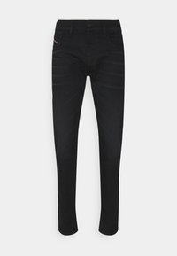 Black denim trousers with a slim fit, standard pockets, and subtle stitching detail. No visible patterns or hardware accents.