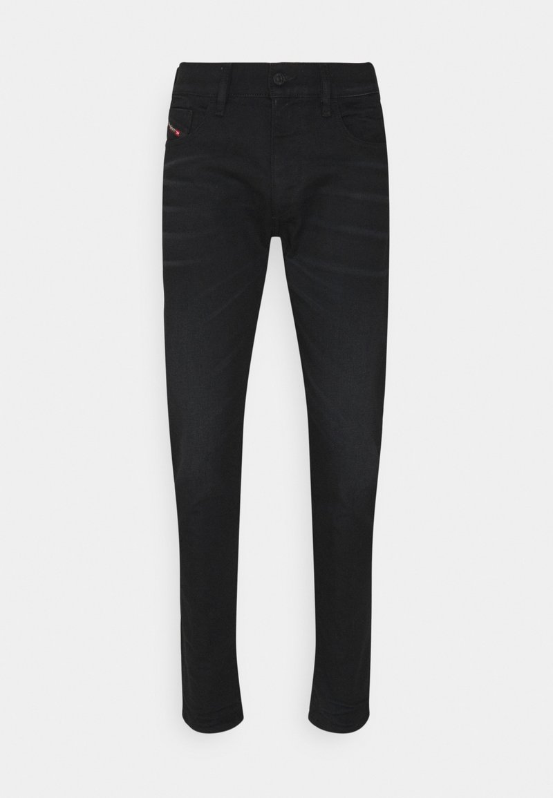 Black denim trousers with a slim fit, standard pockets, and subtle stitching detail. No visible patterns or hardware accents.