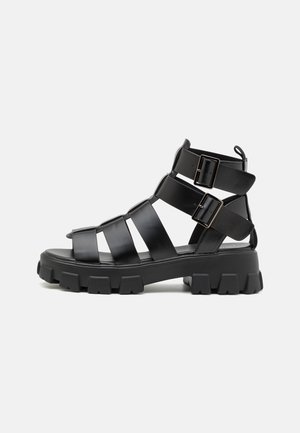 UNISEX - Platform sandals - black