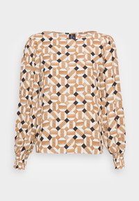 Blouse à manches longues avec un motif géométrique marron, orange et noir sur fond crème. Présente des poignets élastiques et une coupe décontractée.
