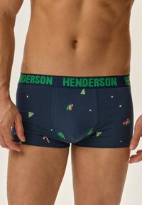 Męskie granatowe majtki z zielonym pasem "HENDERSON". Udekorowane świątecznymi wzorami, takimi jak choinki, cukrowe laski i gwiazdy.