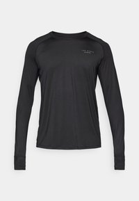 Juodas ilgomis rankovėmis sportinis marškinėlis, pagamintas iš lygios, lengvos medžiagos. Yra apvalūs kaklo kraštai, plokšti siūlai ir subtilus logotipas, atspaustas ant krūtinės.