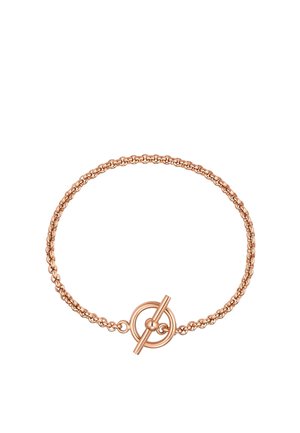 Delicate rose gold chain bracelet with a circular toggle clasp on a white background.